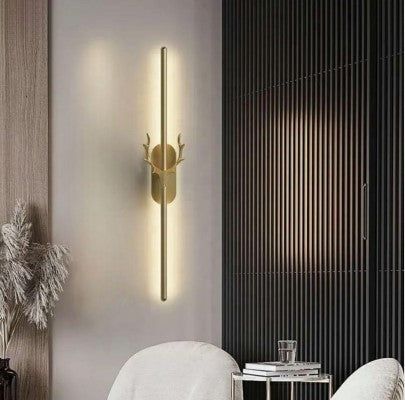 A modern LED wall lamp featuring a long vertical